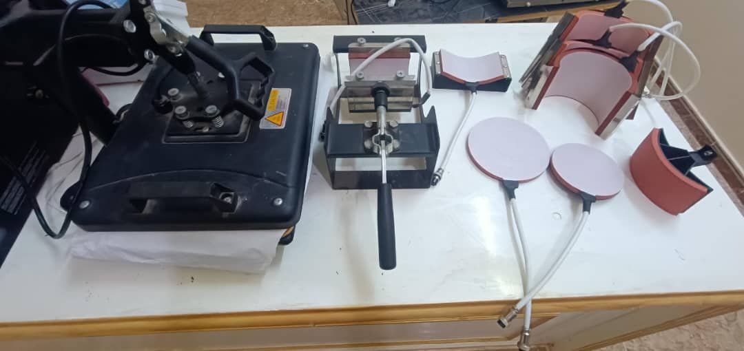 مكبس حراري 1 في ٨ مع العُدة+طابعة  حراريه